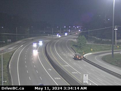 Traffic Cam Hwy-1 in Coquitlam, west of the Brunette Ave overpass, looking east. (elevation: 17 metres) <div style='font-size:8pt;font-style:italic'> <br>View will change temporarily when operators monitor incidents and traffic flow. </div> Player