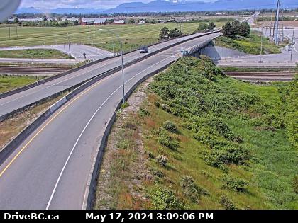 Traffic Cam Hwy-17 (South Fraser Perimeter Rd) at Deltaport Way in South Delta, looking north. (elevation: 6 metres) Player