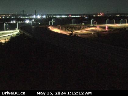 Traffic Cam Hwy-17 (South Fraser Perimeter Rd) at Deltaport Way in South Delta, looking east. (elevation: 6 metres) Player