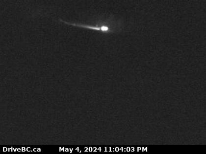 Traffic Cam Hwy-97C (Okanagan Connector), about 22 km west of 97/97C Jct, looking west. (elevation: 1271 metres) <div style='font-size:8pt;font-style:italic'> <br>Camera power provided by Brenda Mines. </div> Player