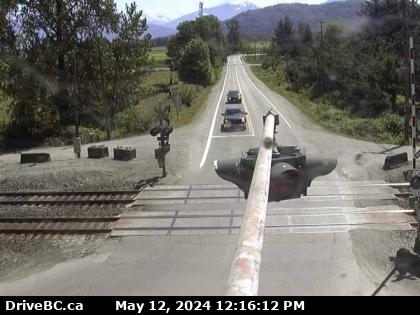 Hwy-7 at Deroche Rd and Nicomen Rd railway crossing, looking west. (elevation: 19 metres) Traffic Camera