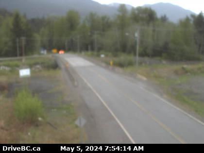 Traffic Cam Hwy-113, near Village of Laxgalts'ap (Greenville) in the Nass Valley, looking eastbound. (elevation: 21 metres) Player